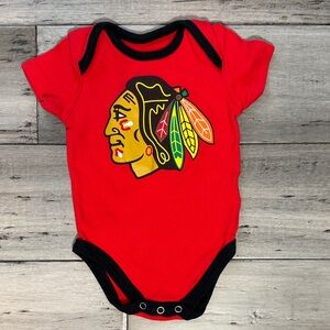 NWOT NHL Red Baby Bodysuit with Black Trim and Feather Logo